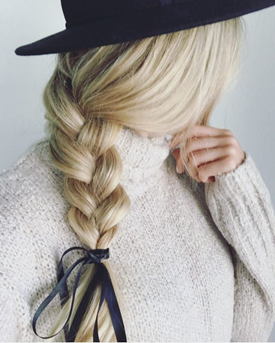 Blonde hair in a side braid